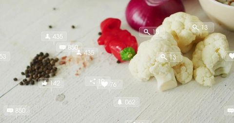 Fresh Cauliflower, Peppers, and Social Media Engagement Icons