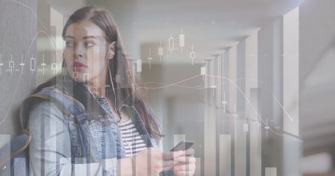 Young Woman Engaged with Stock Market Data on Smartphone