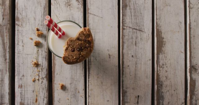 Milk and Chocolate Chip Cookie on Rustic Table - Download Free Stock Images Pikwizard.com