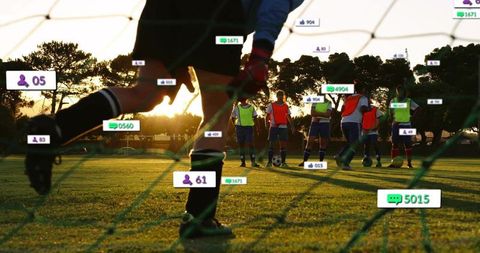 Female goalkeeper kicking through net at sunset with soccer team and social overlays