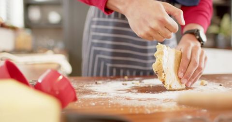 Caucasian Woman Baking Christmas Treats at Home Kitchen - Download Free Stock Images Pikwizard.com