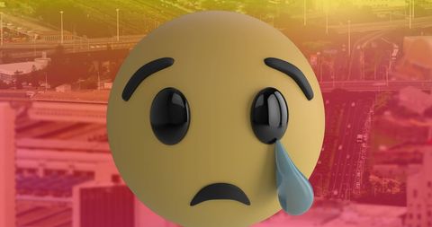 Crying Emoji Over Cityscape Background Illustrates Emotions - Download Free Stock Images Pikwizard.com