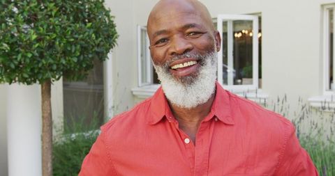 Senior Man Smiling Confidently in Garden: Serenity and Contentment - Download Free Stock Images Pikwizard.com