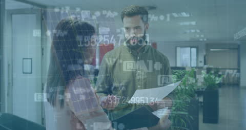 Business Colleagues Discussing Financial Report with Data Overlay