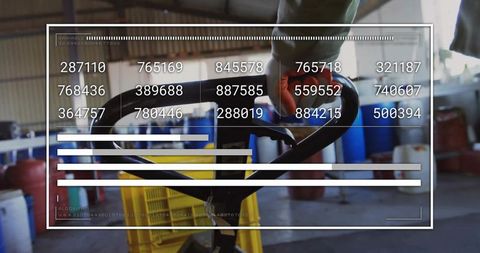 Warehouse Operator Using Pallet Jack With Digital Logistics Overlay