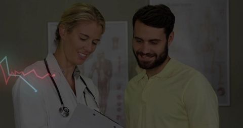 Doctor Consults with Patient in Medical Office Setting