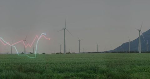 Wind turbines with financial graph renewable energy concept