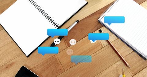 Digital Speech Bubbles Over Desk Workspace for Creativity and Collaboration