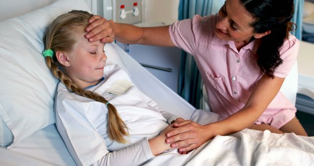 Mother comforting sick kid in hospital bed, child patient care - Download Free Stock Images Pikwizard.com