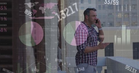 Businessman analyzing infographics and data on cellphone