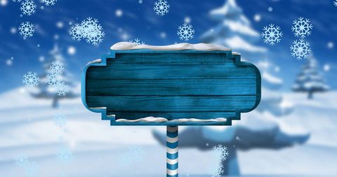 Snow-Filled Winter Scene with Blank Wooden Sign