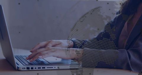 Businesswoman typing on laptop with dotted globe overlay, remote work and productivity