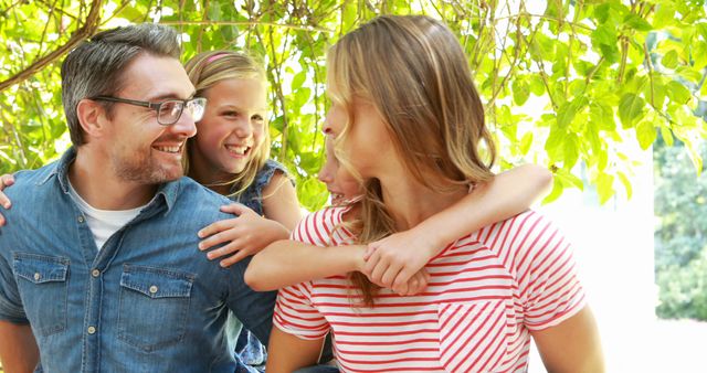 Happy Family Enjoying Quality Time Outdoors - Download Free Stock Images Pikwizard.com