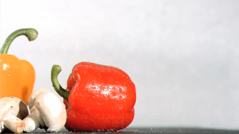 Colorful Vegetables Refreshing with Slow Motion Water Splash
