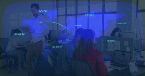 Standing man presenting to team in modern open office with analytics dashboard overlay