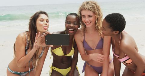 Diverse Group of Friends Taking Selfie on Beach in Colorful Swimsuits - Download Free Stock Images Pikwizard.com