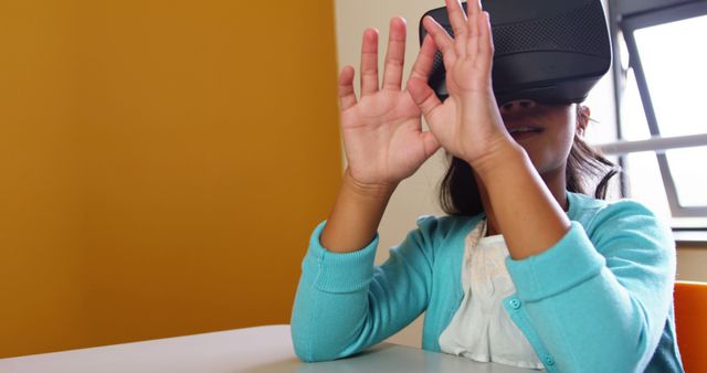 Young Girl Exploring Virtual Reality with VR Headset in Class - Download Free Stock Images Pikwizard.com