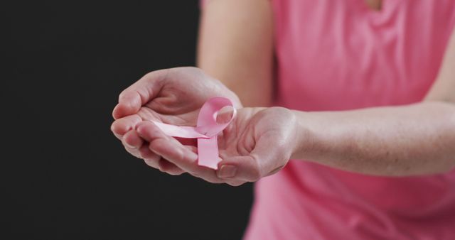 Hands Holding Pink Breast Cancer Awareness Ribbon - Download Free Stock Images Pikwizard.com