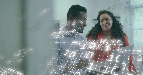 Discussing binary data visualization on laptop, collaborative team with holographic overlay
