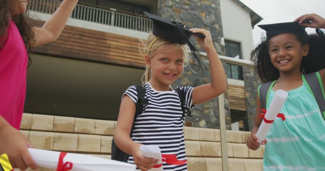 Children Celebrating Graduation Outdoors Holding Diplomas and Caps - Download Free Stock Images Pikwizard.com