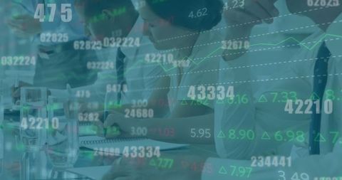 Futuristic Business Team Analyzing Data with Technological Overlay - Download Free Stock Images Pikwizard.com