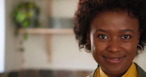 Confident African American Woman in Stylish Attire at Home
