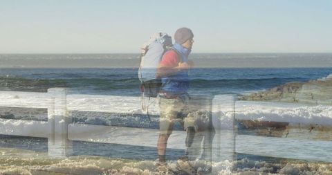Hiker Observing Ocean Waves on Coastal Walkway