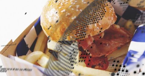 Tasty bacon cheeseburger with fries in retro urban style