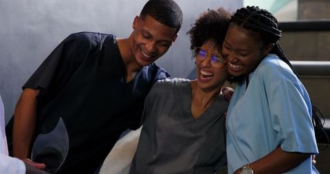 Joyful Multiracial Healthcare Team Celebrating Achievement