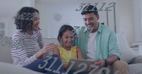 Family sharing tablet, smiling together on couch with floating number overlay