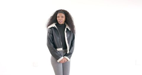 Confident African American Woman in Stylish Leather Jacket