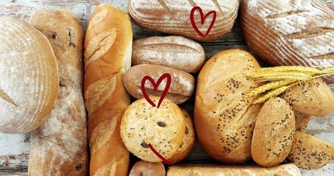 Diverse Artisan Bread Spread with Decorative Hearts - Download Free Stock Images Pikwizard.com