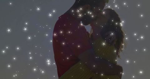 Romantic Couple Embracing in Sparkling Twilight