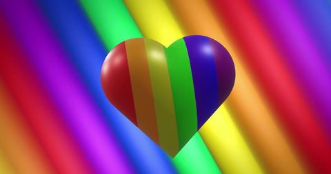 A brightly colored heart in rainbow hues hovers over a striped background of the same vibrant colors. Representing LGBTQ pride and unity, this can be used for Pride Month celebrations, promotional materials focusing on human rights and equality, or any activity celebrating diversity and love. Ideal for social media posts, event invitations, or educational resources about inclusivity.