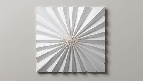 Radiating folded paper wall panel creating geometric origami sunburst with soft shadows