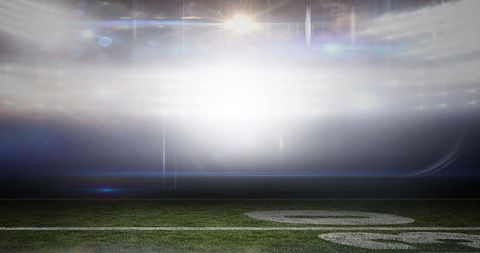 Floodlit Sports Stadium with Blurred Bokeh Lights