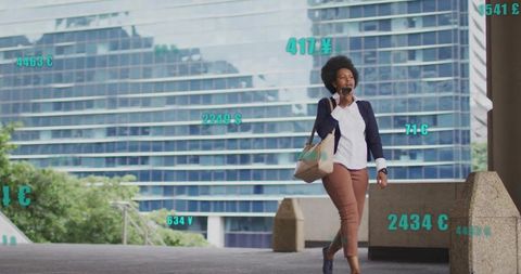 Urban businesswoman engaged in phone call with currency data visualization