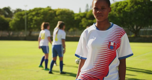 Confident Female Soccer Player on Field - Download Free Stock Images Pikwizard.com