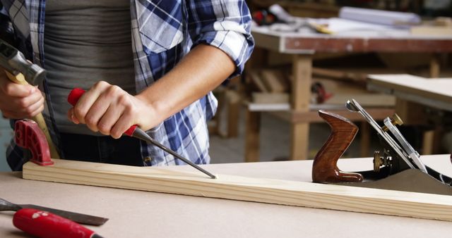 Carpenter Working in Workshop Using Hammer and Chisel - Download Free Stock Images Pikwizard.com