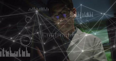 Scientist analyzing digital network with graphs