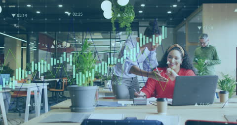 Diverse Team Analyzing Financial Data on Digital Graphs