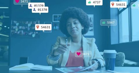 Professional woman pointing pen in social media analytics review with engagement overlays