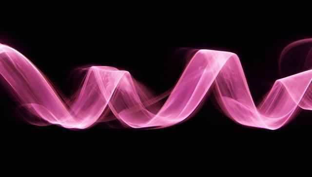 Glowing pink light ribbon against black background