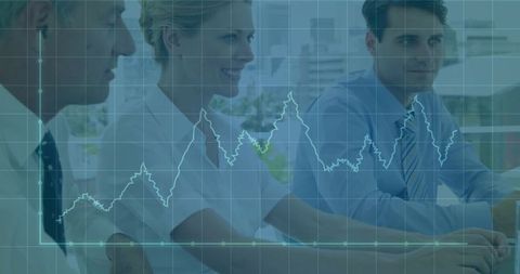 Financial Team Analyzing Graph in Business Meeting