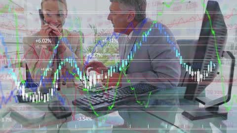 Business Professionals Discussing Financial Data with Growth Charts