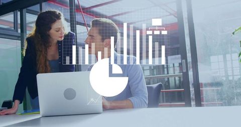 Teamwork Analyzing Data with Digital Charts in Modern Office