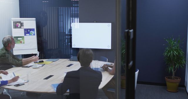 Business colleagues having a meeting in office conference room - Download Free Stock Images Pikwizard.com