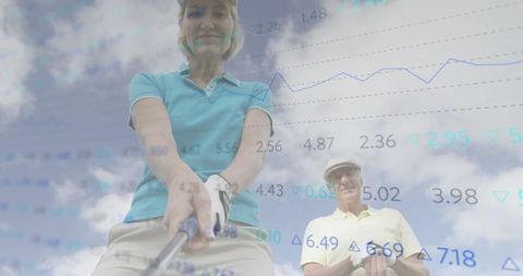 Senior golfer swinging with data overlay in background