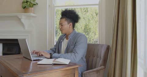 Man concentrated on remote work at home office desk