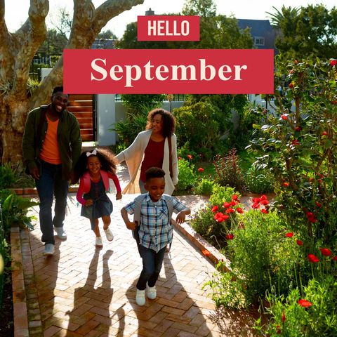 Happy Family Strolling Through Sunny September Garden